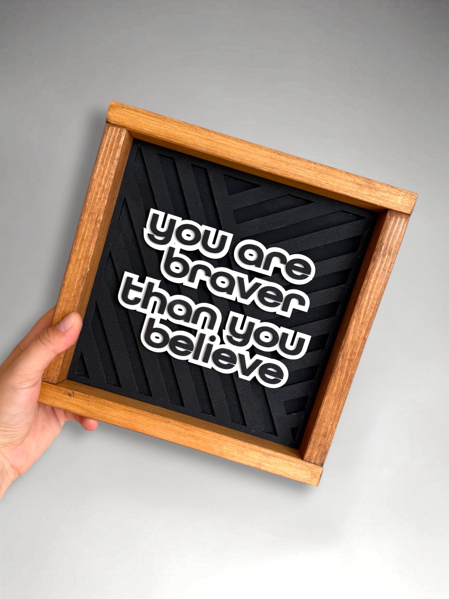 Braver Than You Belive Sign