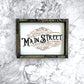Meet Me On Main Street Sign