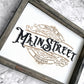 Meet Me On Main Street Sign