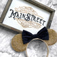 Meet Me On Main Street Sign
